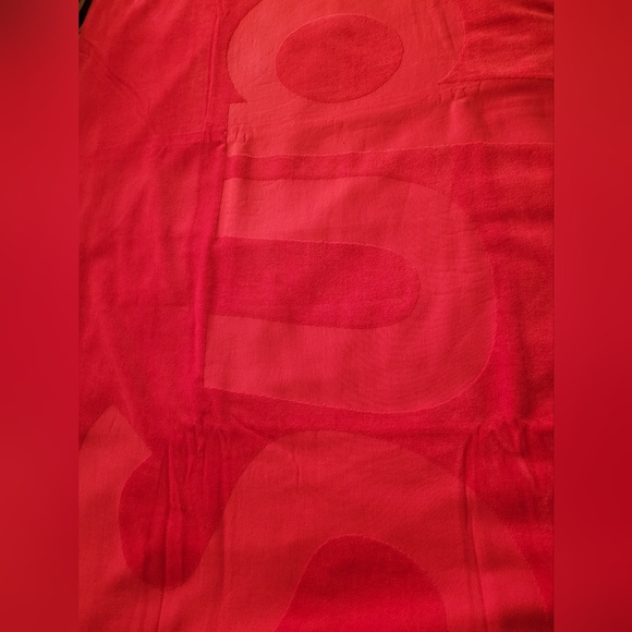Brand new supreme towel in red perfect for the beach or